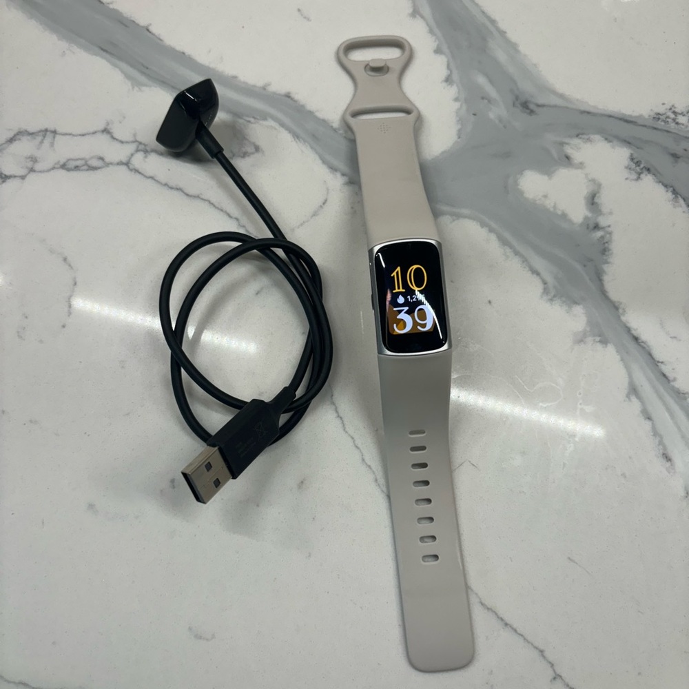 Fitbit Charge 6 with accessories